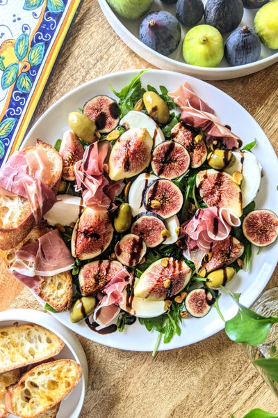 Arugula, Fig, Prosciutto & Mozzarella Salad w/ Garlic & Chili Crostini