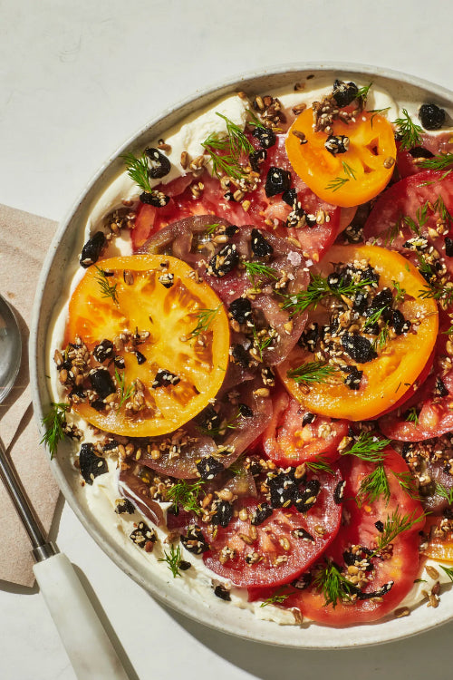 Tomato Salad with Crème Fraîche, Olives & Crunchy Seeds